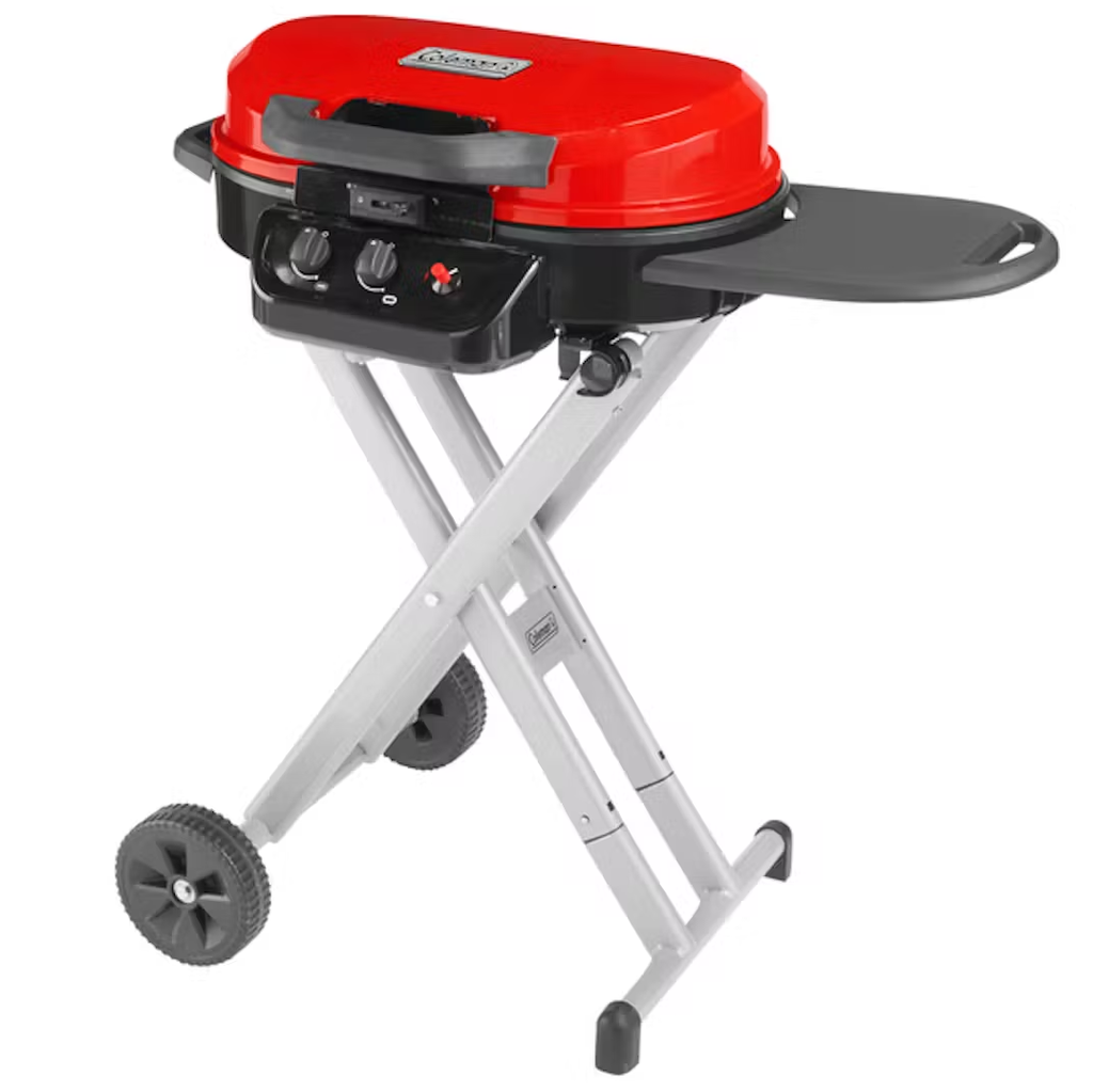 Parrillera A Gas Coleman RoadTrip Portatil 11000 Btu Con Perilla Ruedas Y Estante Rojo Y Negro